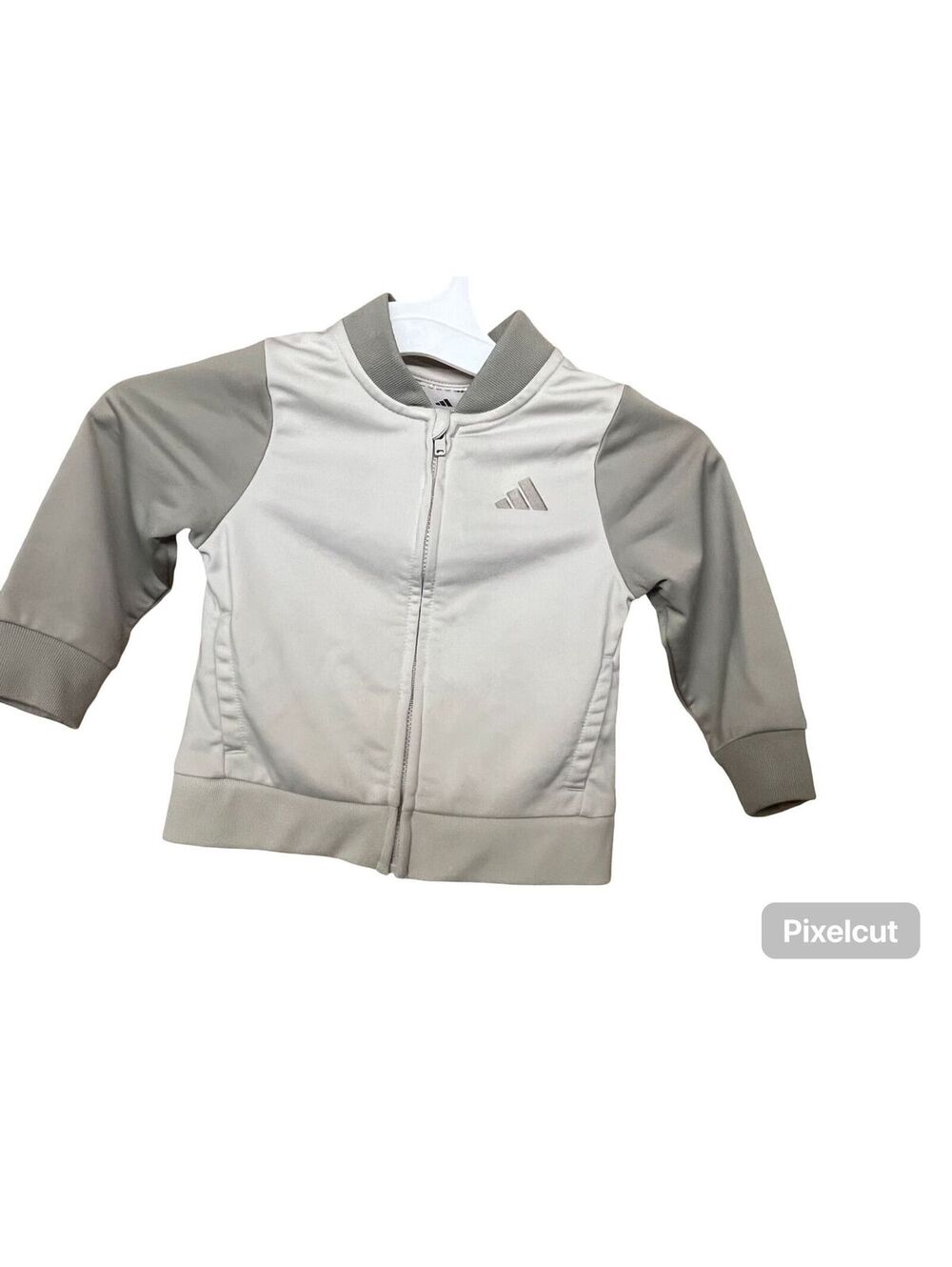 Adidas cream and gray sweatshirt with a ribbed collar.